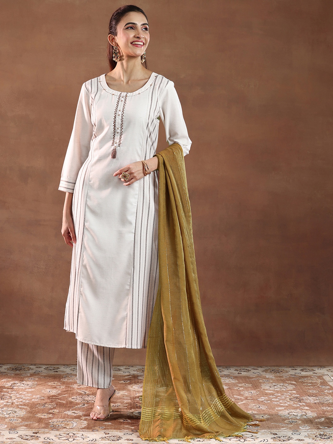 Libas Striped Panelled Thread Work Straight Kurta with Trousers & Dupatta, Off white
Libas Striped Panelled Thread Work Straight Kurta with Trousers & Dupatta, Off white