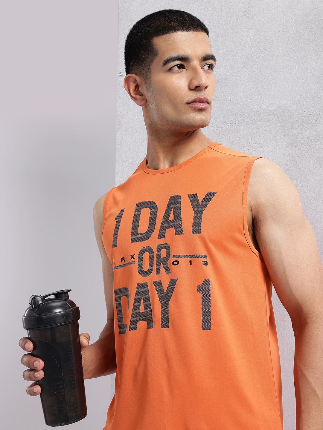 HRX by Hrithik Roshan Sleeveless Typography Printed Rapid-Dry Training T-shirt, Orange
HRX by Hrithik Roshan Sleeveless Typography Printed Rapid-Dry Training T-shirt, Orange