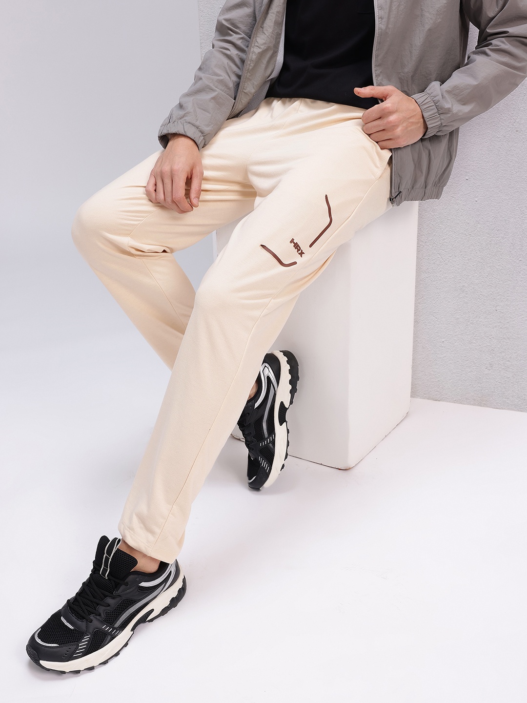 HRX by Hrithik Roshan Men Brand Logo Detail Regular Fit Lifestyle Track Pants, Cream
HRX by Hrithik Roshan Men Brand Logo Detail Regular Fit Lifestyle Track Pants, Cream