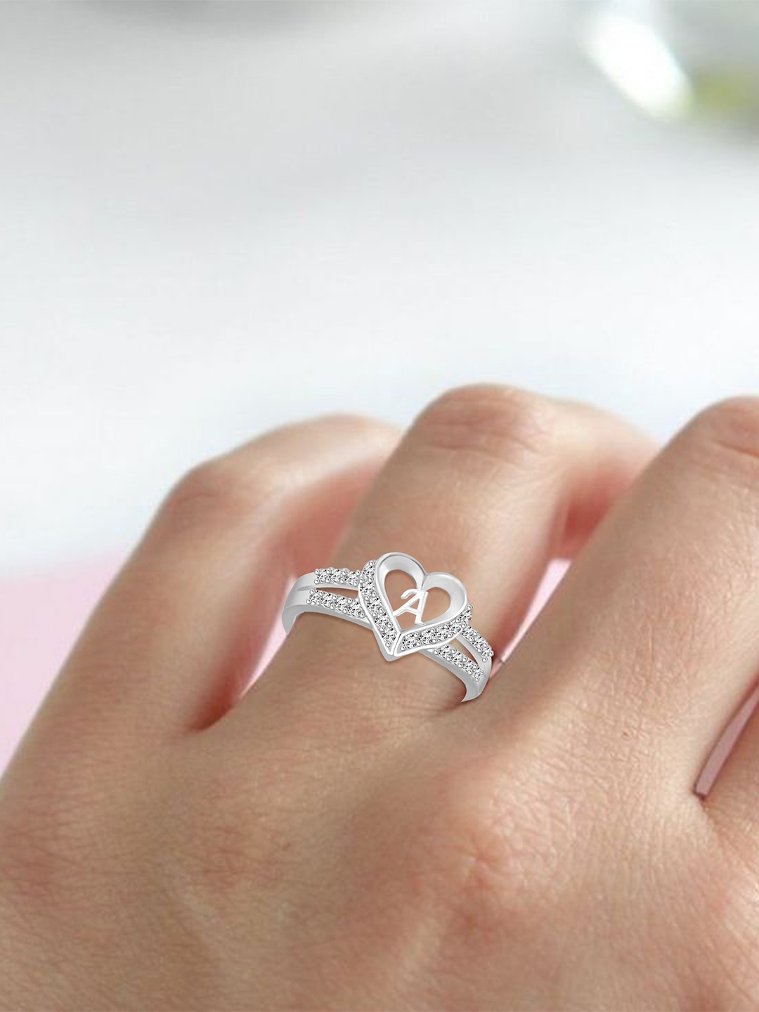 Lila Unisex Silver-Plated Cubic Zirconia Stone Studded Alphabet A Adjustable Finger Ring
Lila Unisex Silver-Plated Cubic Zirconia Stone Studded Alphabet A Adjustable Finger Ring