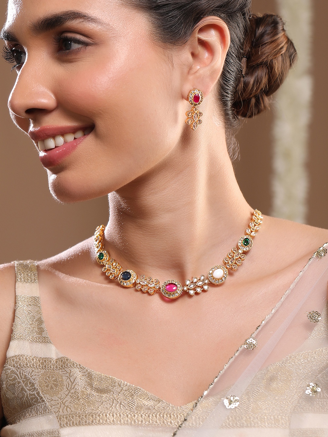Rubans 22K Gold-Plated Multicolor Stone & Cubic Zirconia Studded Necklace Set with Earring
Rubans 22K Gold-Plated Multicolor Stone & Cubic Zirconia Studded Necklace Set with Earring