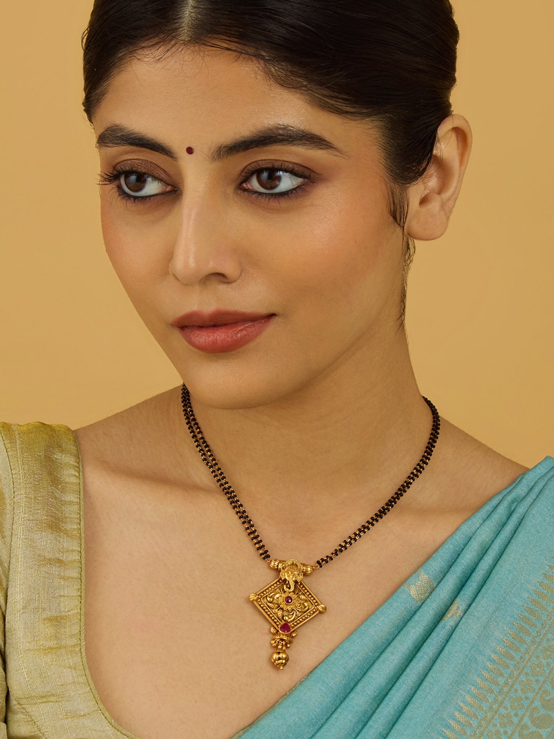 Kushal's Fashion Jewellery Antique Gold-Plated Ruby Stone Studded & Beaded Mangalsutra
Kushal's Fashion Jewellery Antique Gold-Plated Ruby Stone Studded & Beaded Mangalsutra