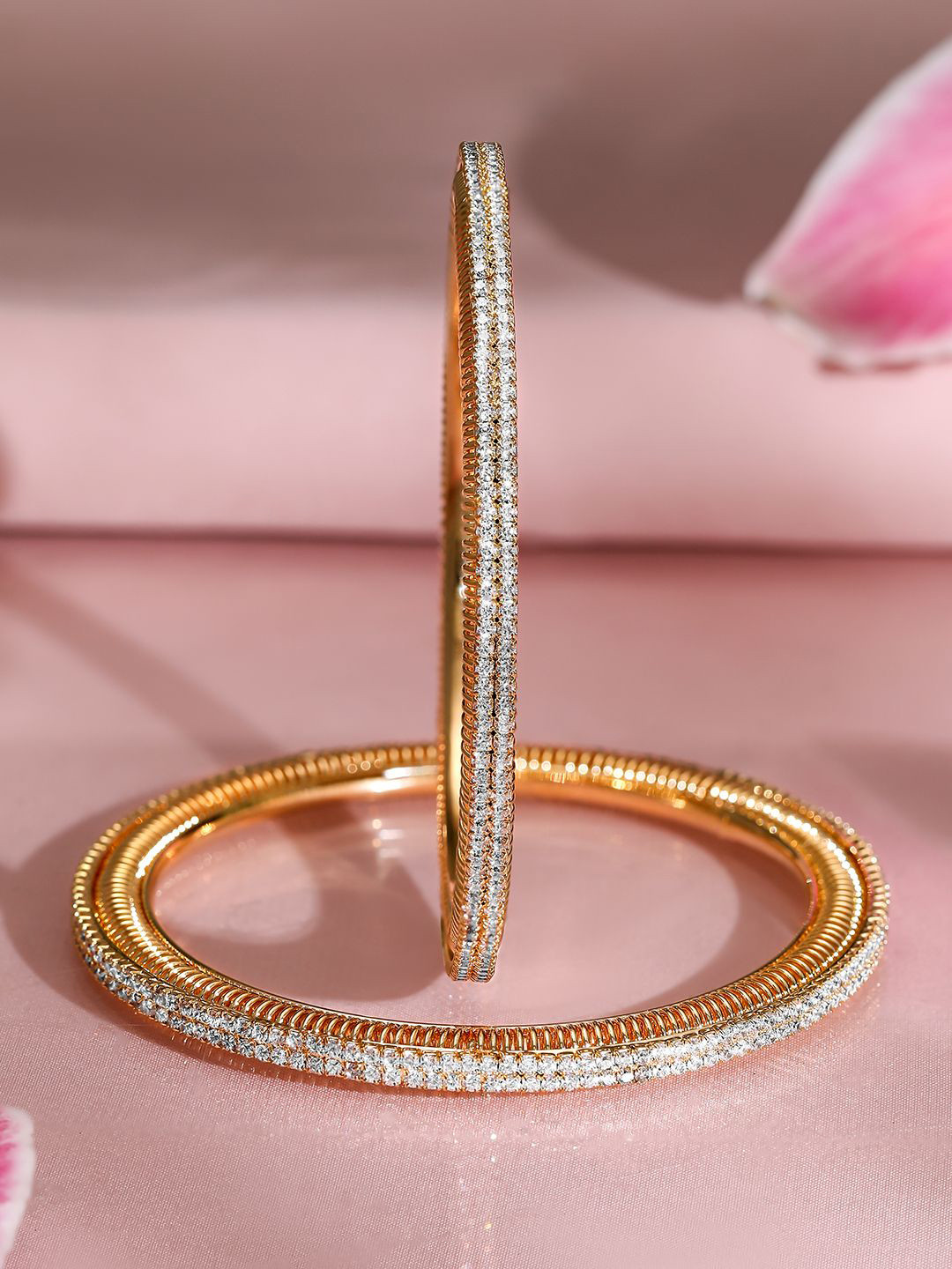 Rubans Set of 2, 22K Gold-Plated Cubic Zirconia Studded Sparkling Premium Bangles
Rubans Set of 2, 22K Gold-Plated Cubic Zirconia Studded Sparkling Premium Bangles