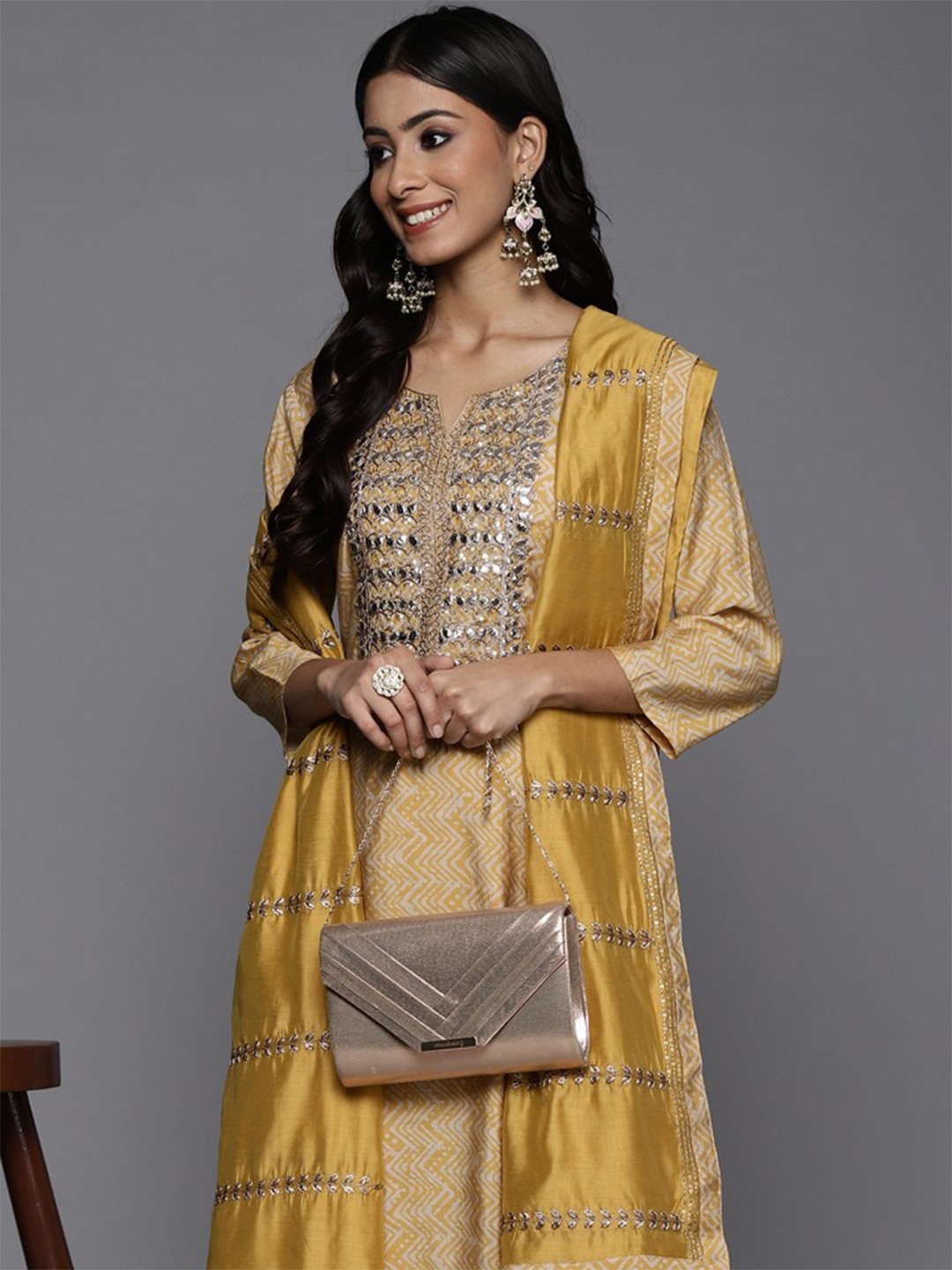 Varanga Women Embroidered Kurta with Gotta Patti, Zari & Mirror, Trousers and Dupatta, Mustard
Varanga Women Embroidered Kurta with Gotta Patti, Zari & Mirror, Trousers and Dupatta, Mustard