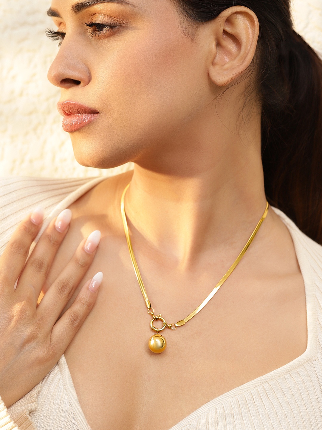 Rubans Voguish 18K Gold Plated StainlessSteel TarnishFree Demi-Fine Ball Pendant Necklace
Rubans Voguish 18K Gold Plated StainlessSteel TarnishFree Demi-Fine Ball Pendant Necklace