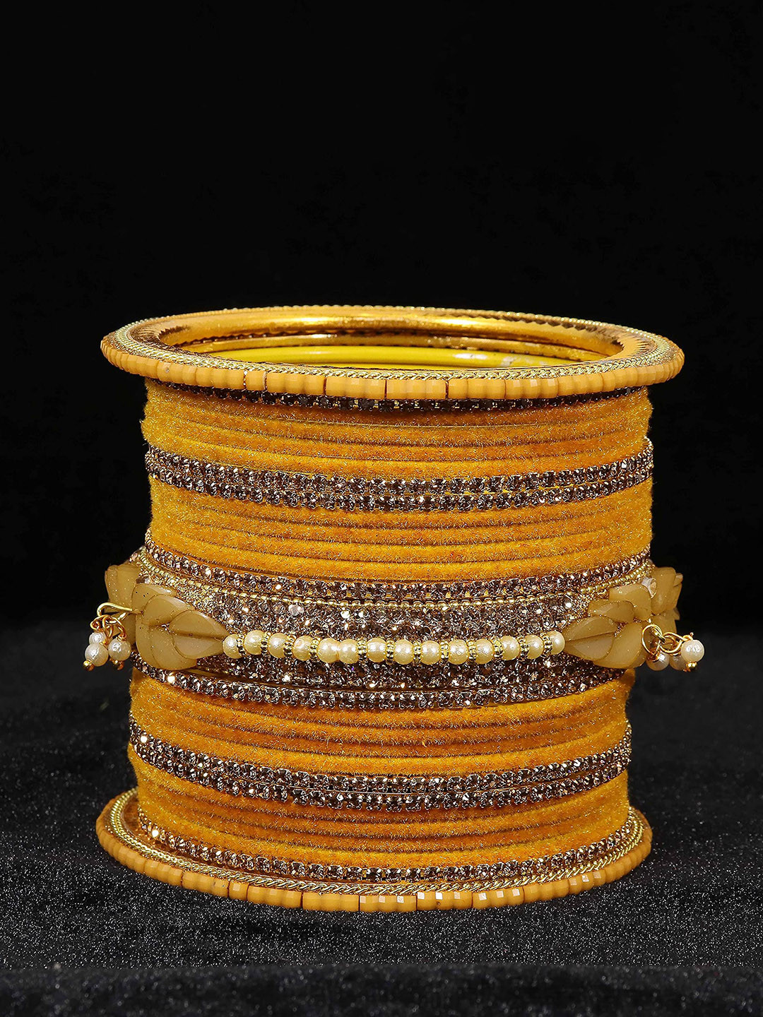 ZULKA Set of 40 Zircon Gemstone and Bells Latkan Linked Velvet Bangles For Women, Peach
ZULKA Set of 40 Zircon Gemstone and Bells Latkan Linked Velvet Bangles For Women, Peach