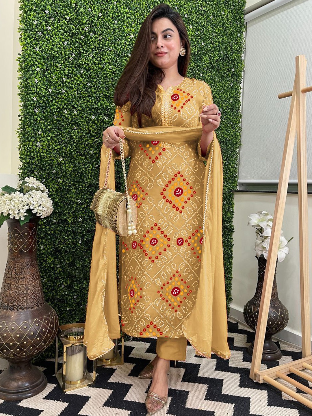 Anni Designer Bandhani Printed Notch Neck Straight Kurta With Trousers & Dupatta, Yellow
Anni Designer Bandhani Printed Notch Neck Straight Kurta With Trousers & Dupatta, Yellow