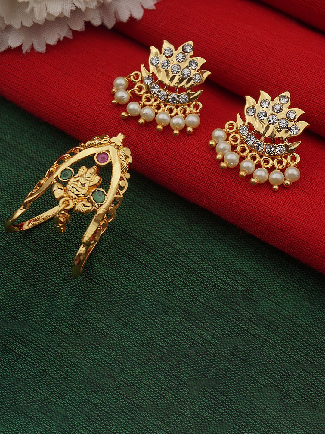 PINAAKA DARINI Gold-Plated 1 Gram Floral Pearls Lakshmi Vanki Vangi Studs With Ring
PINAAKA DARINI Gold-Plated 1 Gram Floral Pearls Lakshmi Vanki Vangi Studs With Ring