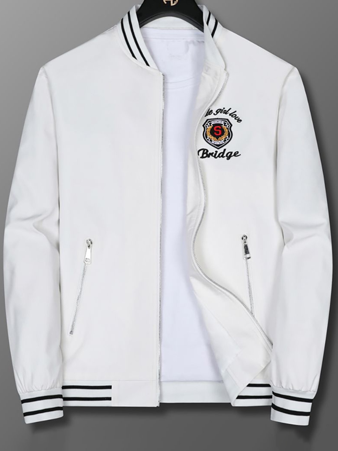 StyleCast x Revolte Men Stand Collar Graphic Embroidered Casual Bomber Jacket, White
StyleCast x Revolte Men Stand Collar Graphic Embroidered Casual Bomber Jacket, White