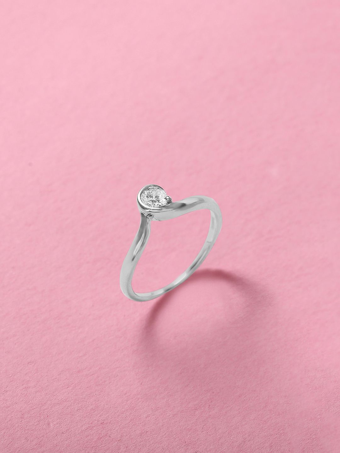 Mia by Tanishq 92.5 Sterling Silver Curved Elegance Cubic Zirconia Studded Finger Ring
Mia by Tanishq 92.5 Sterling Silver Curved Elegance Cubic Zirconia Studded Finger Ring