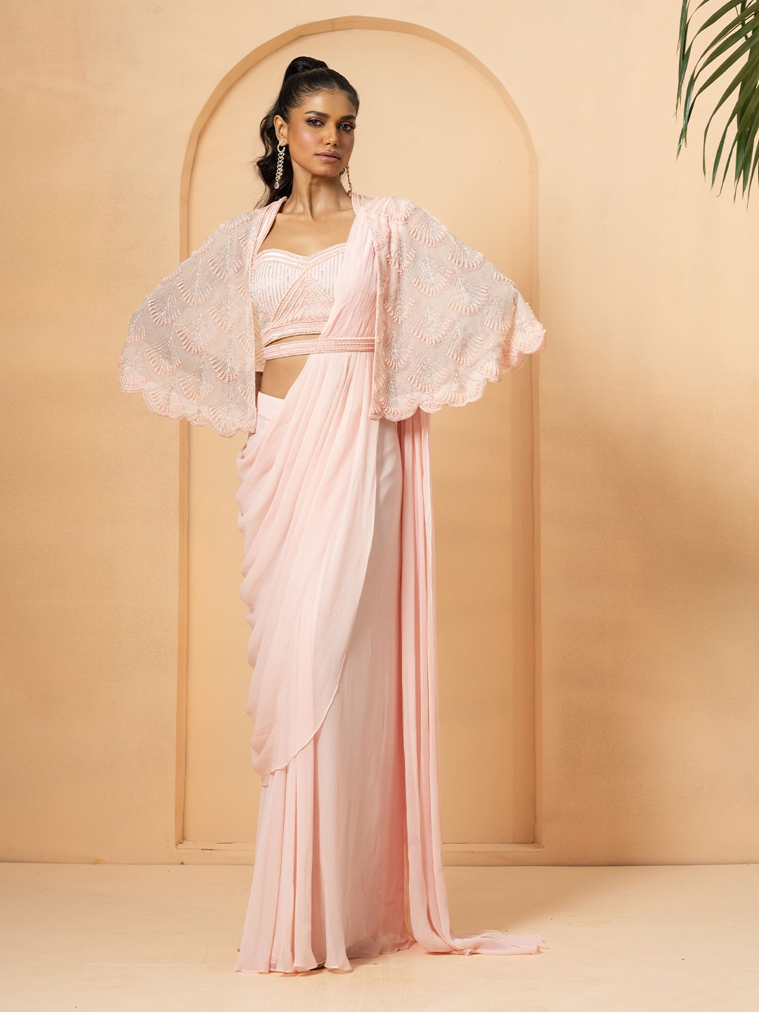 Quench A Thirst Ethnic Motifs Beads and Stones Pure Georgette Pre-Draped Saree, Pink
Quench A Thirst Ethnic Motifs Beads and Stones Pure Georgette Pre-Draped Saree, Pink