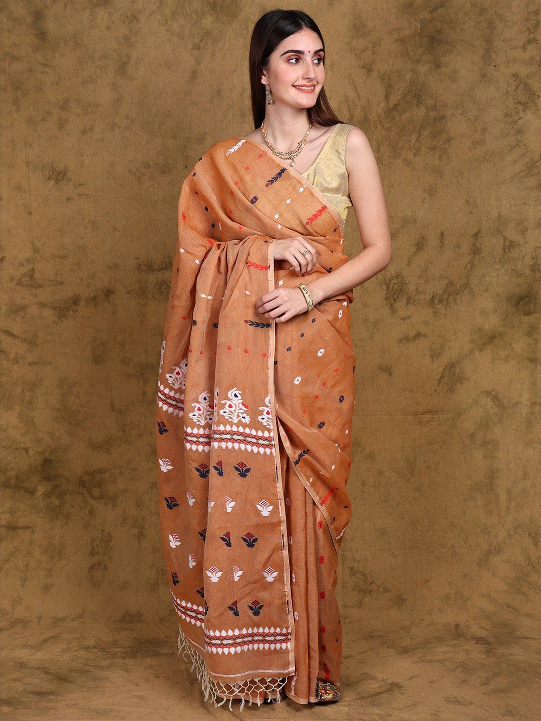 Exotic India Toasted Nut Pure Cotton Jamdani Saree with All Over Woven Bootis, Brown
Exotic India Toasted Nut Pure Cotton Jamdani Saree with All Over Woven Bootis, Brown
