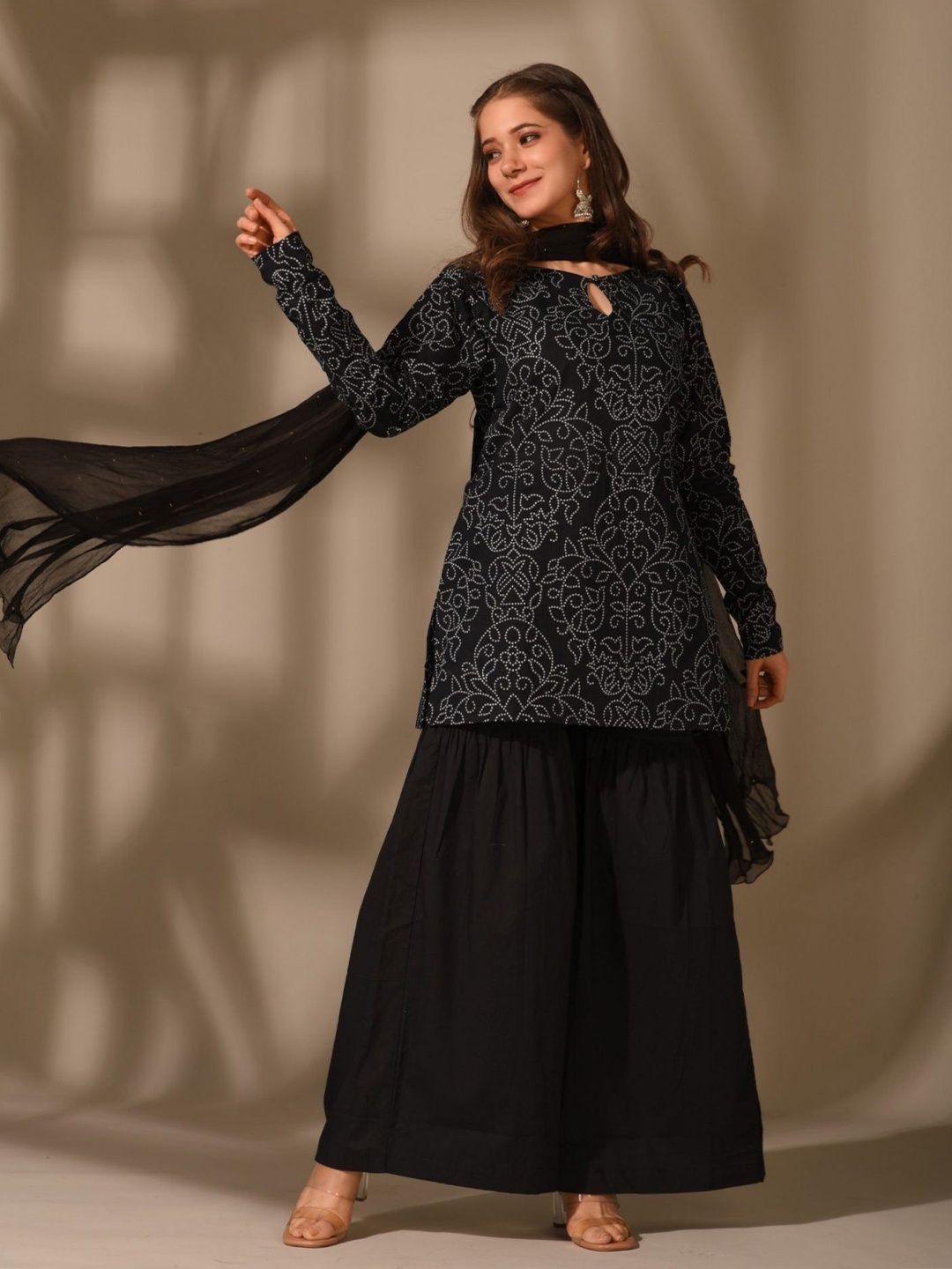 DIMPLE DESIGN STUDIO Bandhani Printed Pure Cotton Straight Kurti With Palazzos & Dupatta, Black
DIMPLE DESIGN STUDIO Bandhani Printed Pure Cotton Straight Kurti With Palazzos & Dupatta, Black