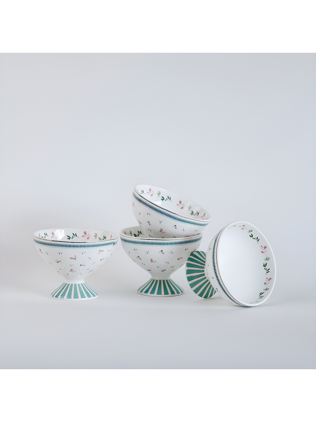 The Wishing Chair White & Turquoise Blue Printed Bone China Glossy Cups Set of Cups and Mugs
The Wishing Chair White & Turquoise Blue Printed Bone China Glossy Cups Set of Cups and Mugs