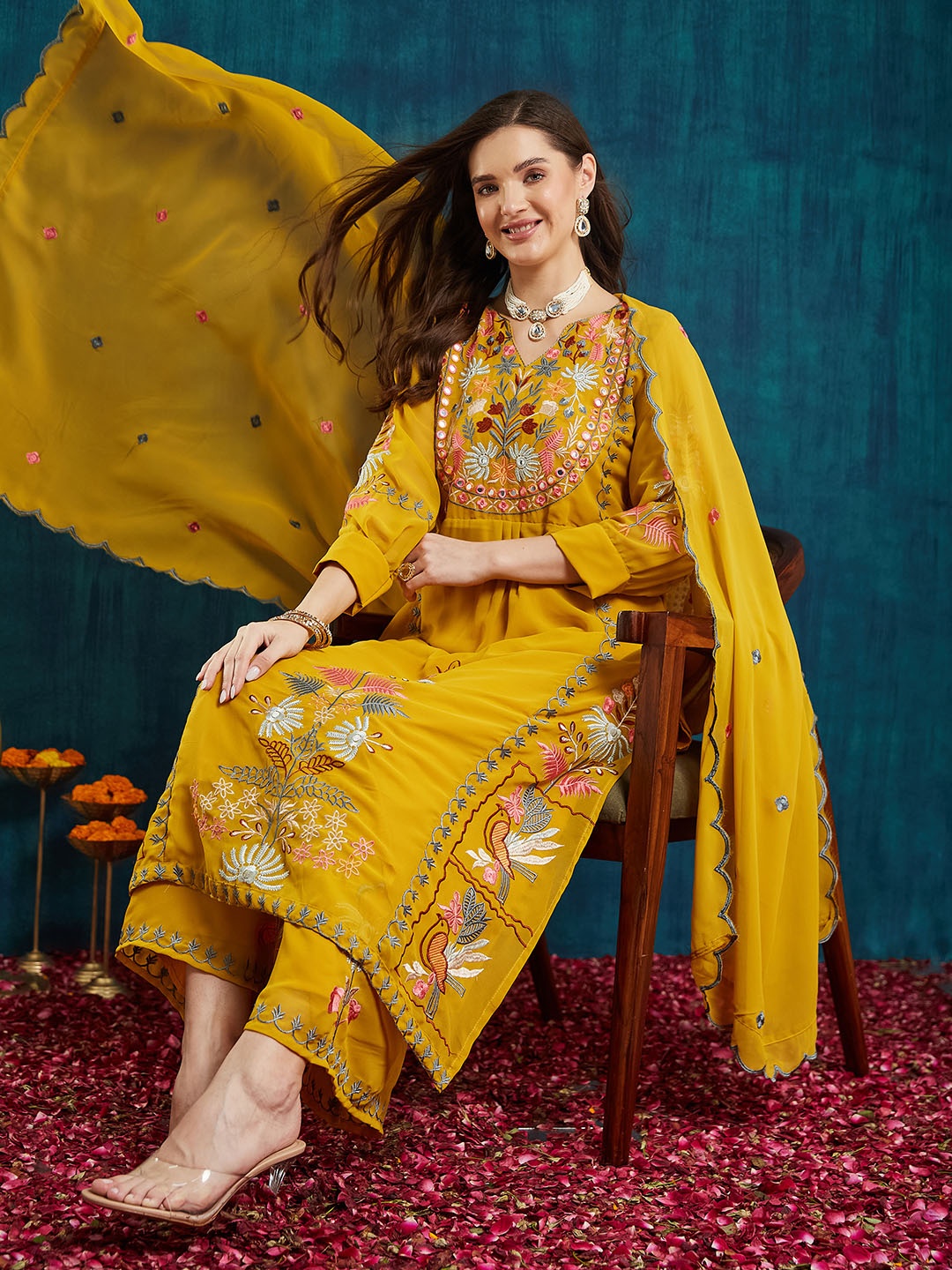 KAVINDI Floral Embroidered Mirror Work Pure Georgette Kurta with Palazzos & Dupatta, Mustard
KAVINDI Floral Embroidered Mirror Work Pure Georgette Kurta with Palazzos & Dupatta, Mustard