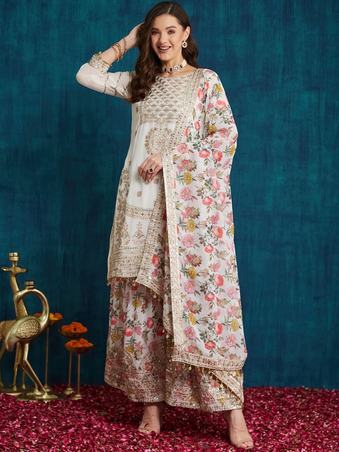 KAVINDI Floral Embroidered Sequinned Pure Georgette Kurta with Sharara & With Dupatta, White
KAVINDI Floral Embroidered Sequinned Pure Georgette Kurta with Sharara & With Dupatta, White