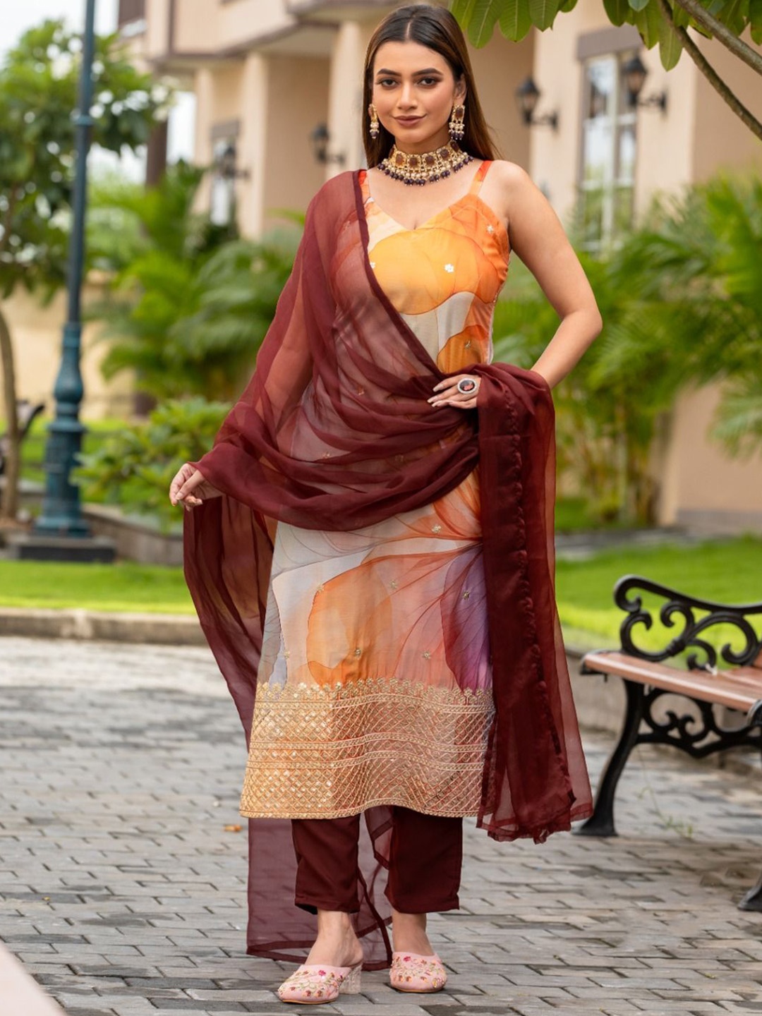 KALINI Floral Printed Sleeveless Sequinned Straight Kurta with Trouser & Dupatta, Orange
KALINI Floral Printed Sleeveless Sequinned Straight Kurta with Trouser & Dupatta, Orange