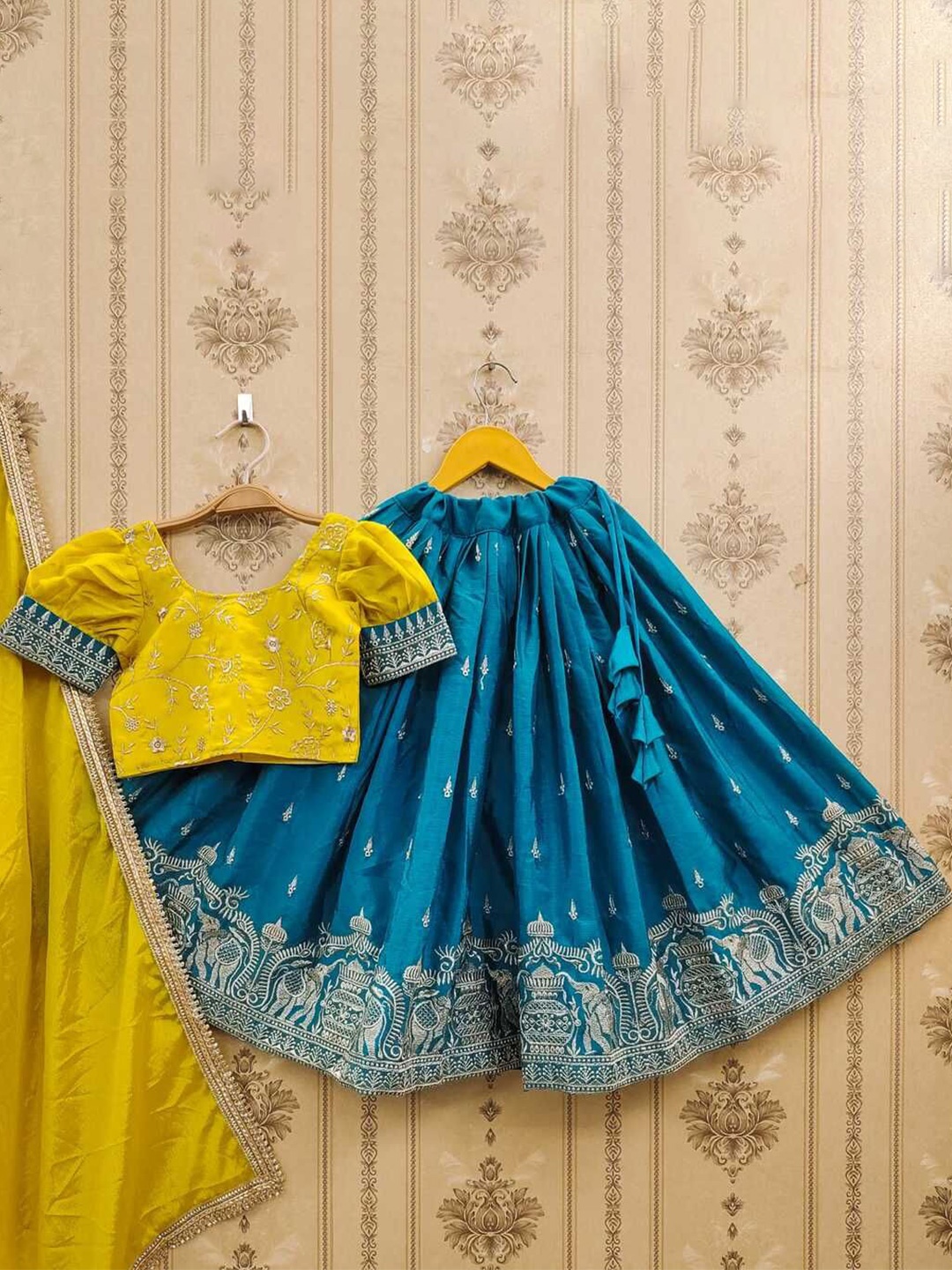 JOVK DESIGN Girls Embroidered Thread Work Tie and Dye Ready to Wear Lehenga & Blouse With Dupatta, Mustard
JOVK DESIGN Girls Embroidered Thread Work Tie and Dye Ready to Wear Lehenga & Blouse With Dupatta, Mustard