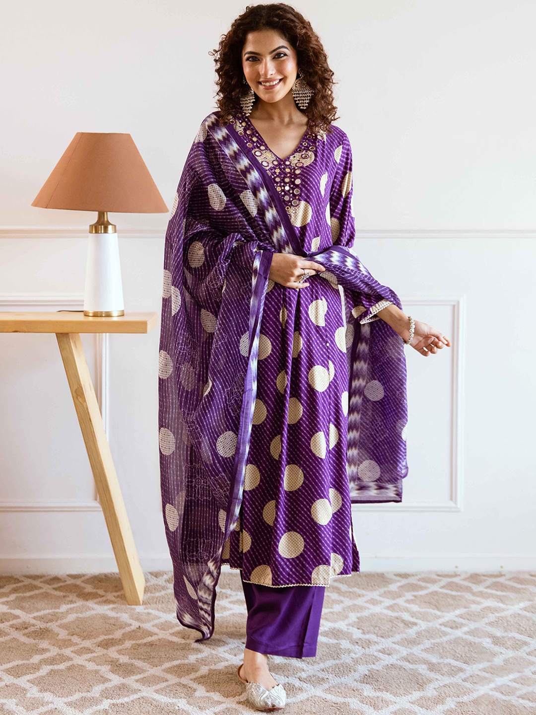 KALINI Women Ethnic Motifs Printed Regular Mirror Work Kurta with Trousers & With Dupatta, Purple
KALINI Women Ethnic Motifs Printed Regular Mirror Work Kurta with Trousers & With Dupatta, Purple