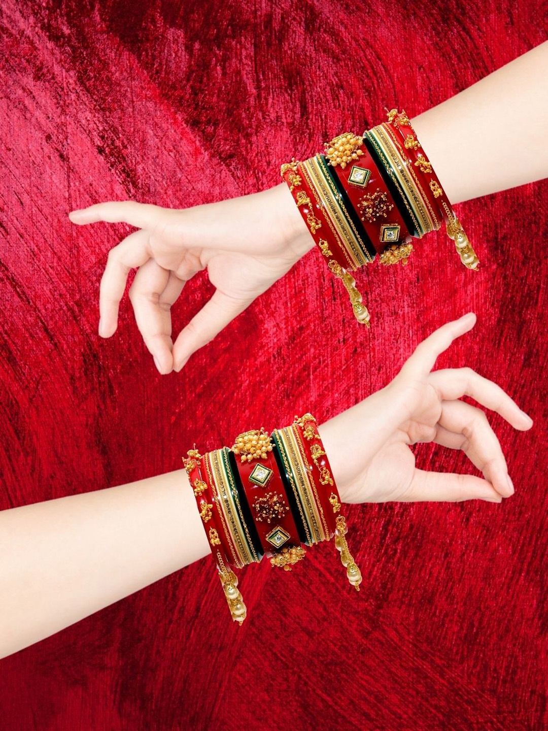 Zindura Pack Of 2 Gold-Plated Pearls-Studded & Beaded Chuda Bangles With Hangings
Zindura Pack Of 2 Gold-Plated Pearls-Studded & Beaded Chuda Bangles With Hangings