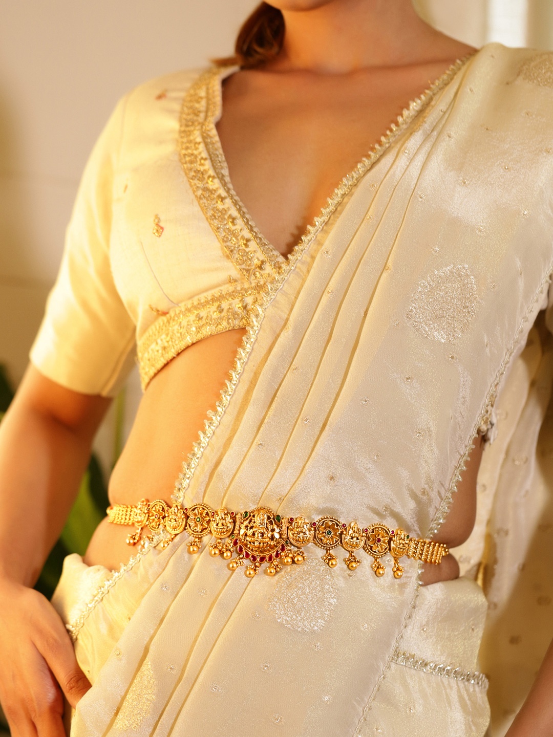 Rubans 22K Gold Plated Artificial Ruby & Emerald Stones Studded Temple Waist Chain
Rubans 22K Gold Plated Artificial Ruby & Emerald Stones Studded Temple Waist Chain