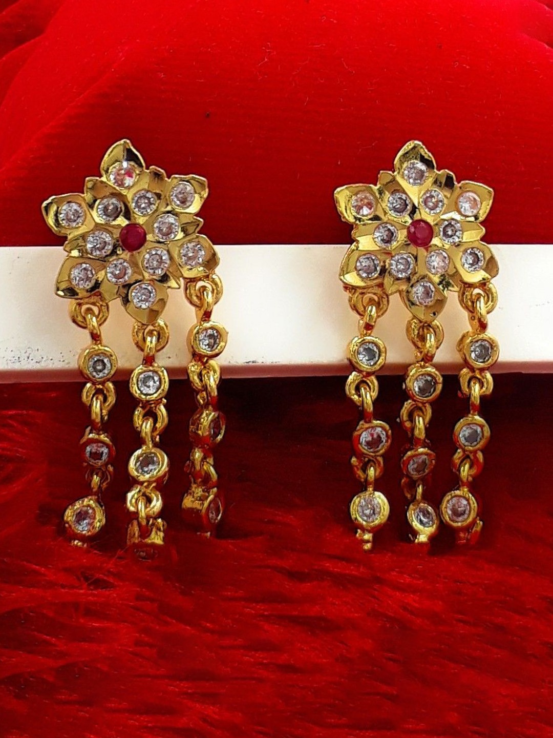 Anujeet Fashion Hub Gold-Plated American Diamond Studded Floral Drop Earrings
Anujeet Fashion Hub Gold-Plated American Diamond Studded Floral Drop Earrings