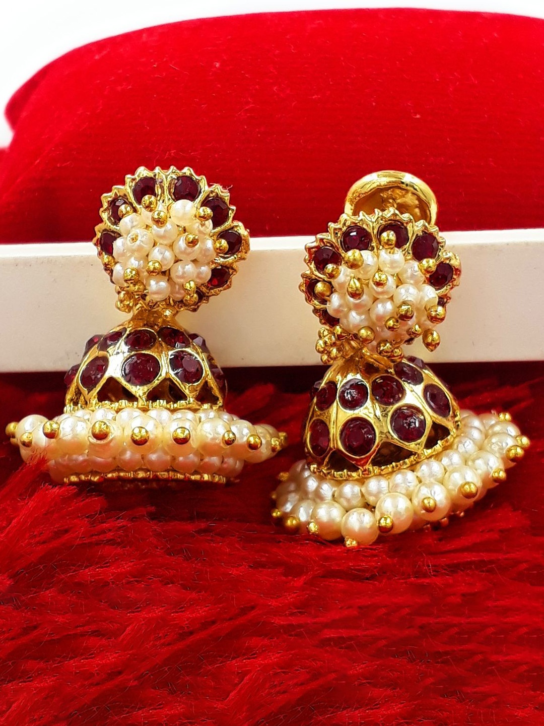 Anujeet Fashion Hub Gold-Plated American Diamond Stones Studded And Pearl Beaded Jhumkas
Anujeet Fashion Hub Gold-Plated American Diamond Stones Studded And Pearl Beaded Jhumkas