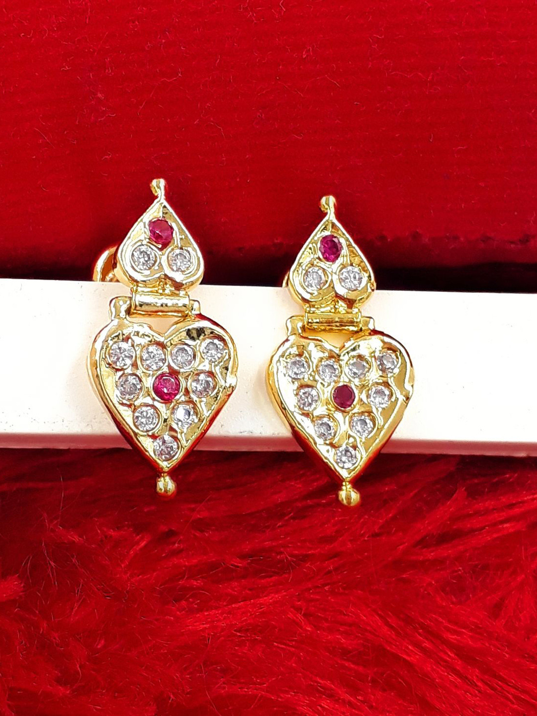 Anujeet Fashion Hub Gold-Plated American Diamond Stones Studded Heart Shaped Drop Earrings
Anujeet Fashion Hub Gold-Plated American Diamond Stones Studded Heart Shaped Drop Earrings
