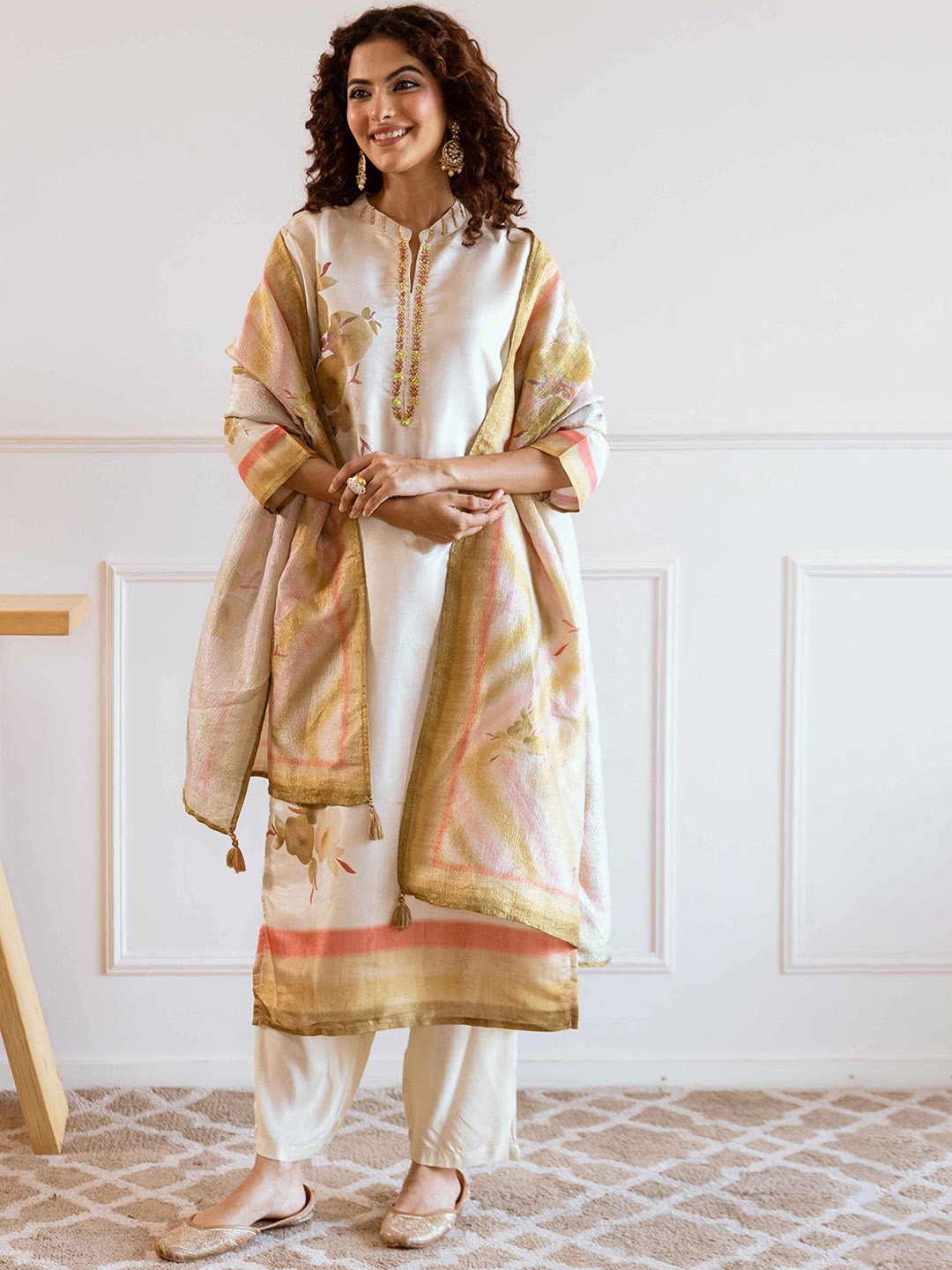 Nehamta Floral Printed Beads and Stones Tissue Silk Straight Kurta with Palazzos & Dupatta, Cream
Nehamta Floral Printed Beads and Stones Tissue Silk Straight Kurta with Palazzos & Dupatta, Cream