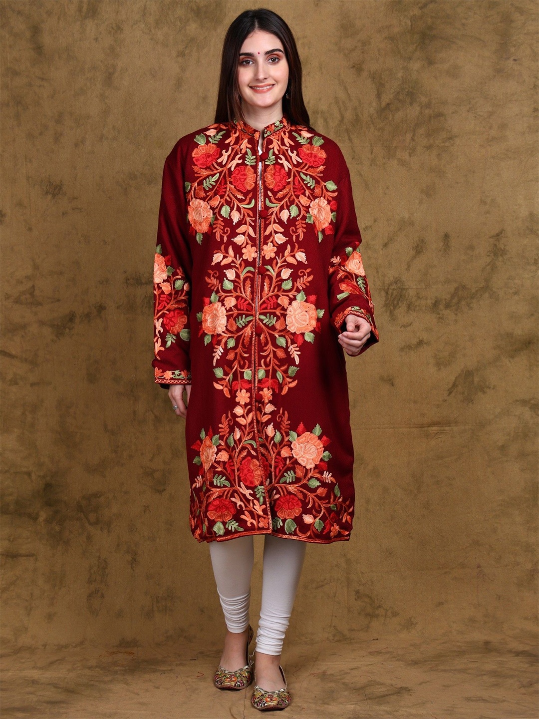 Exotic India Wool Long Jacket from Kashmir with Multicolor Aari Embroidered Floral Motifs, Red
Exotic India Wool Long Jacket from Kashmir with Multicolor Aari Embroidered Floral Motifs, Red