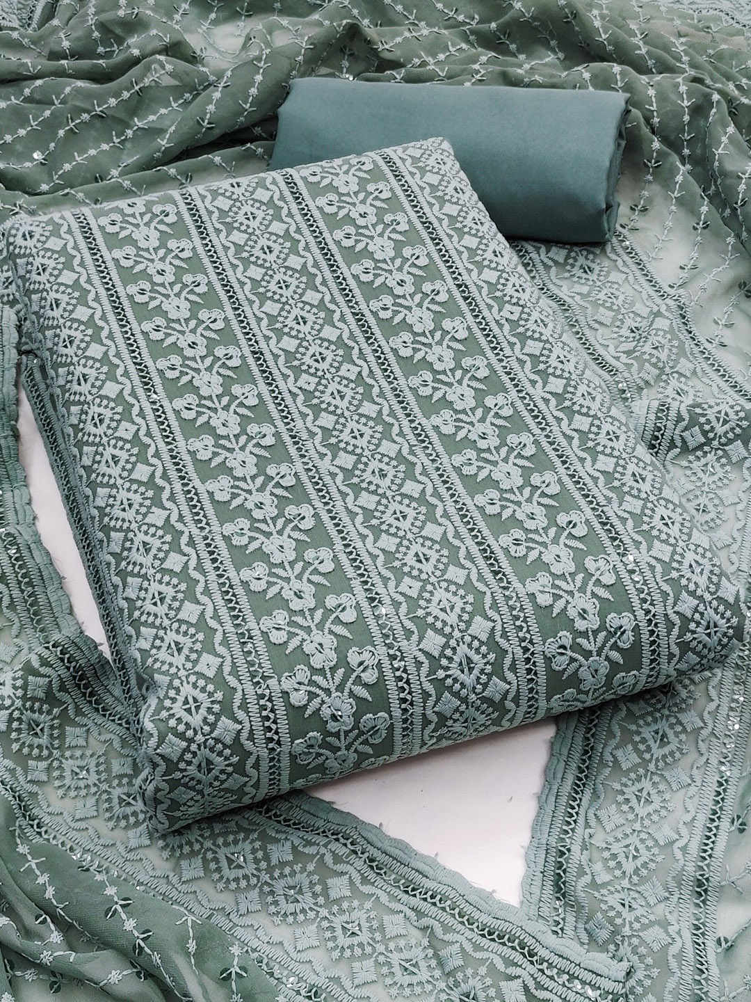 LeeliPeeri Designer Floral Embroidered Chikankari Soft Georgette Unstitched Dress Material, Teal
LeeliPeeri Designer Floral Embroidered Chikankari Soft Georgette Unstitched Dress Material, Teal