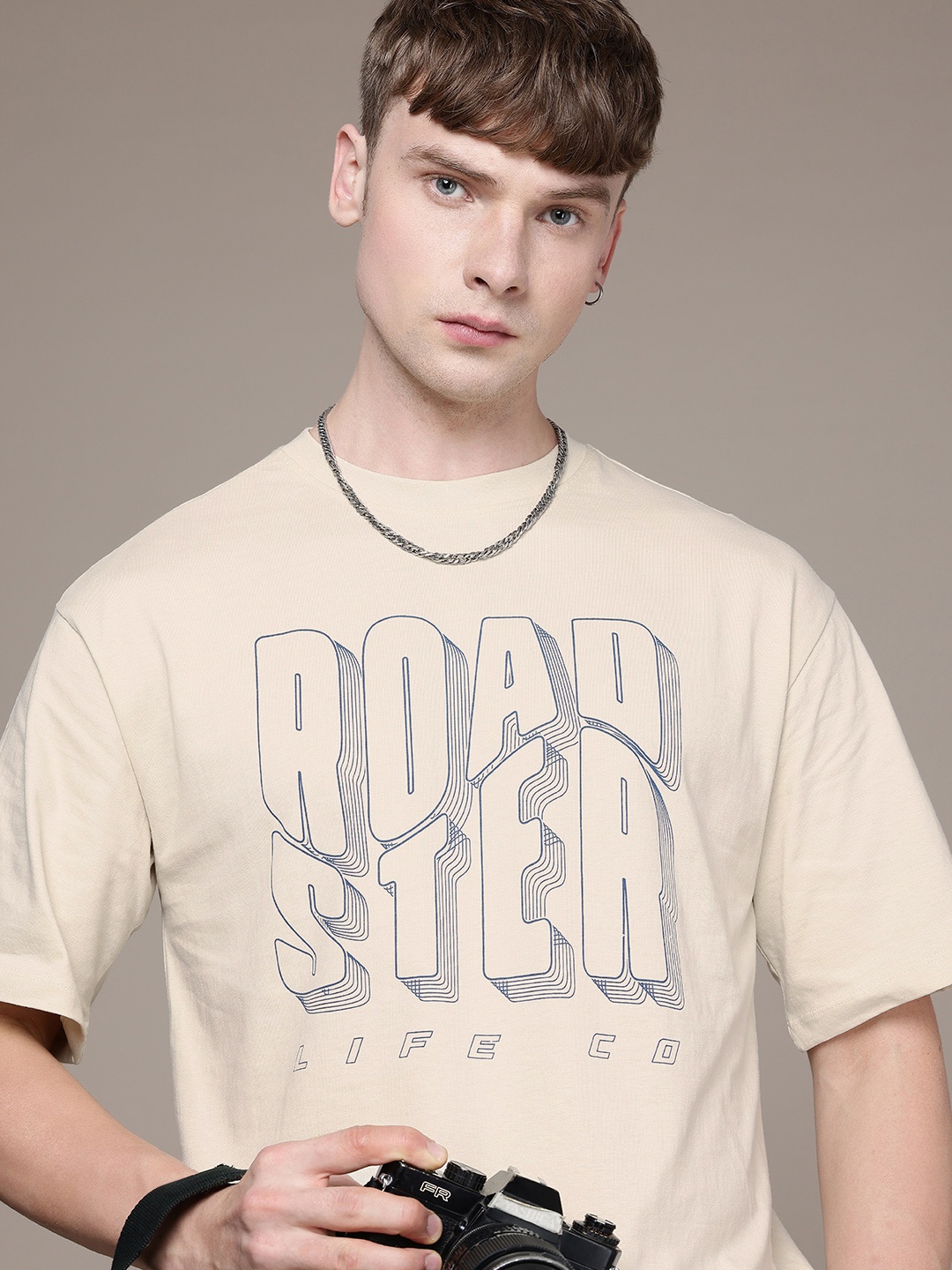The Roadster Life Co. Printed Drop-Shoulder Sleeves Relaxed Fit Pure Cotton T-shirt, Beige
The Roadster Life Co. Printed Drop-Shoulder Sleeves Relaxed Fit Pure Cotton T-shirt, Beige