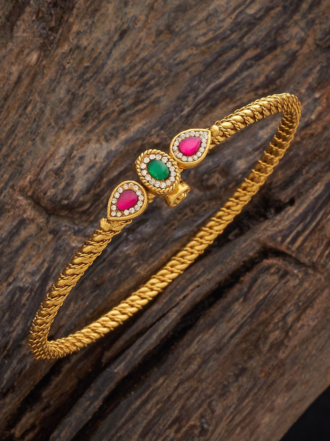 Kushal's Fashion Jewellery Red & Green Stone-Studded Antique Gold-Plated Kada Bracelet
Kushal's Fashion Jewellery Red & Green Stone-Studded Antique Gold-Plated Kada Bracelet