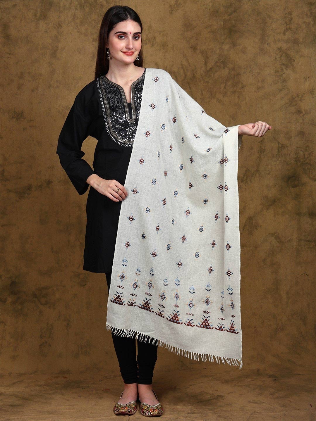 Exotic India Light-Cream Merino Wool Stole from Kutch with Soof Embroidered Motifs, Off white
Exotic India Light-Cream Merino Wool Stole from Kutch with Soof Embroidered Motifs, Off white