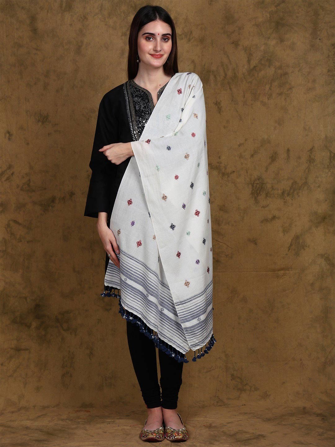 Exotic India Soof Embroidered Pure Cotton Kutch Stole with Stripe Border and Fringe Border, White
Exotic India Soof Embroidered Pure Cotton Kutch Stole with Stripe Border and Fringe Border, White
