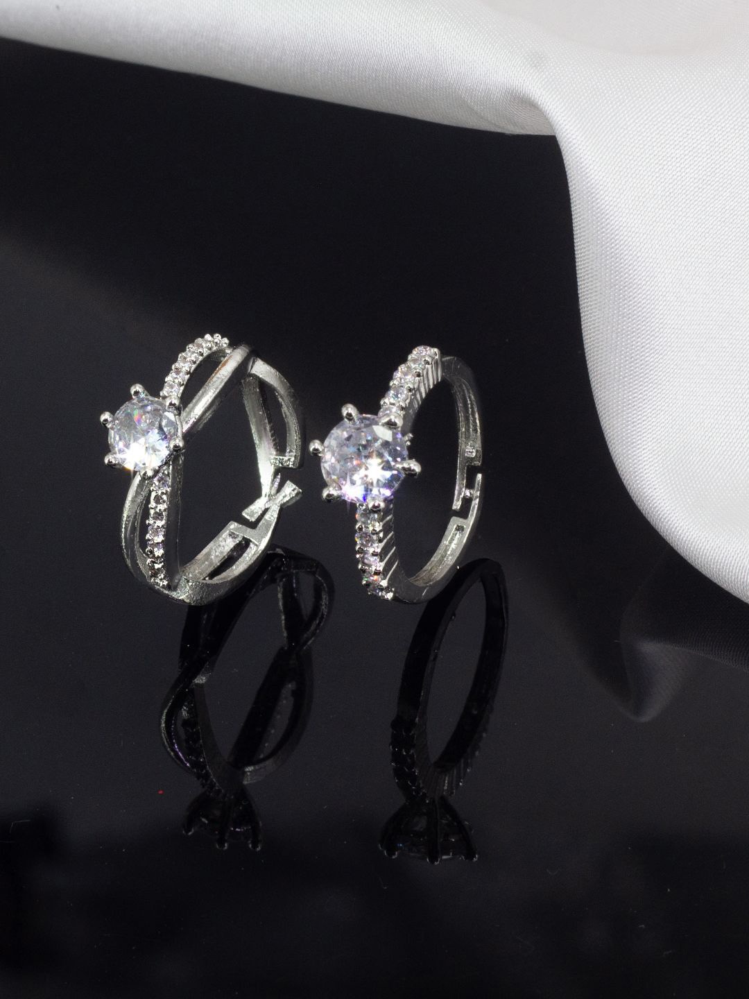 PRIVIU Set Of 2 Rhodium-Plated American Diamond Stone-Studded Adjustable Finger Rings, Silver
PRIVIU Set Of 2 Rhodium-Plated American Diamond Stone-Studded Adjustable Finger Rings, Silver