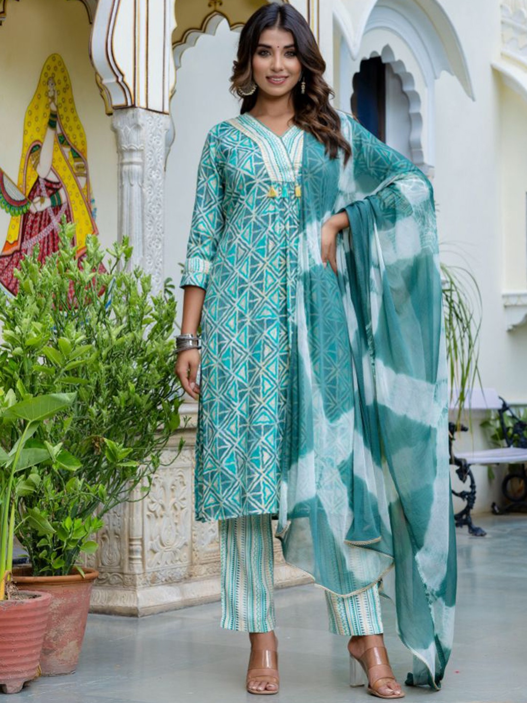 KALINI Women Printed Regular Sequinned Kurta with Trousers & With Dupatta, Turquoise blue
KALINI Women Printed Regular Sequinned Kurta with Trousers & With Dupatta, Turquoise blue