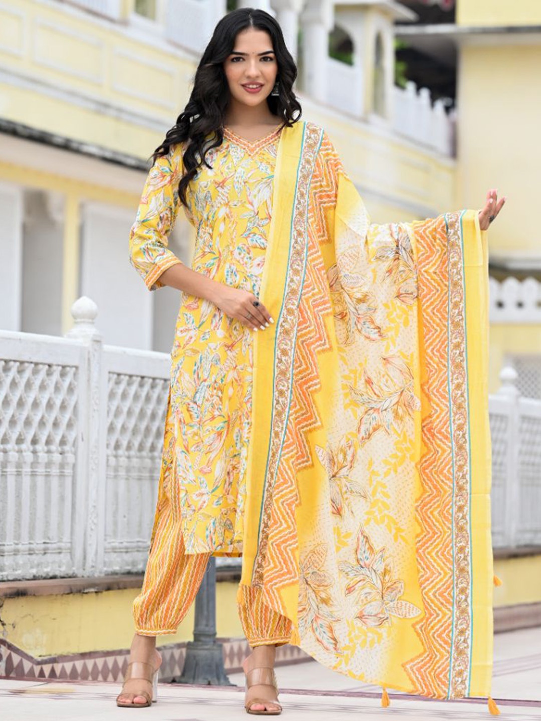 KALINI Women Floral Printed Regular Sequinned Kurta with Trousers & With Dupatta, Yellow
KALINI Women Floral Printed Regular Sequinned Kurta with Trousers & With Dupatta, Yellow