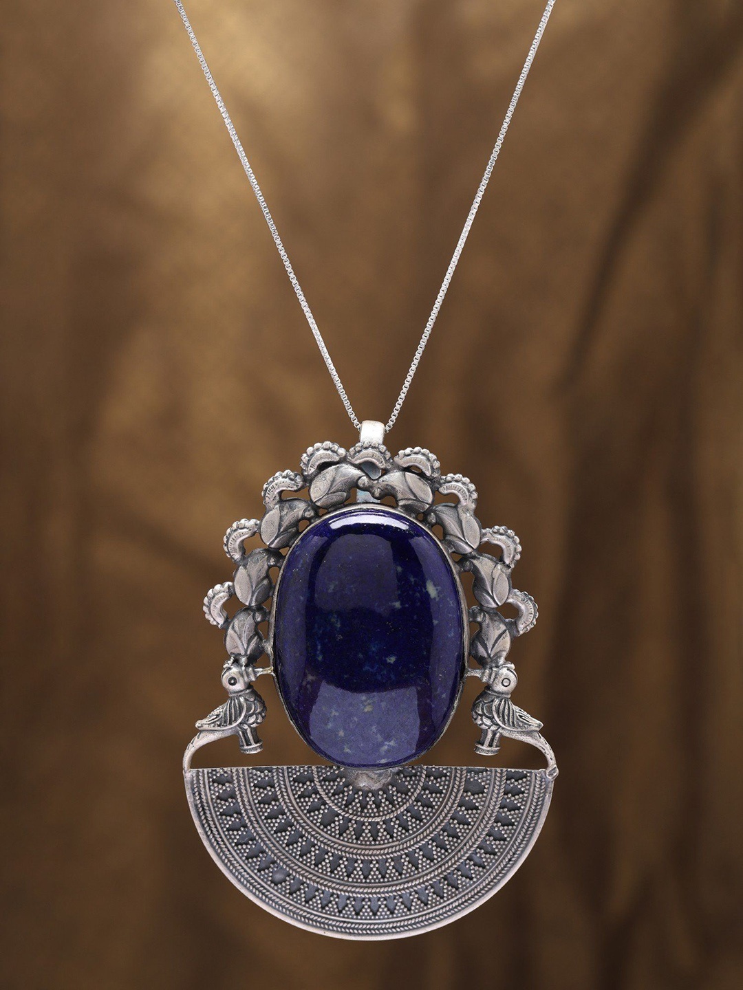 Exotic India Large Lapis Lazuli Pendant with Sterling Silver Semi circle Mandala & Parrots
Exotic India Large Lapis Lazuli Pendant with Sterling Silver Semi circle Mandala & Parrots