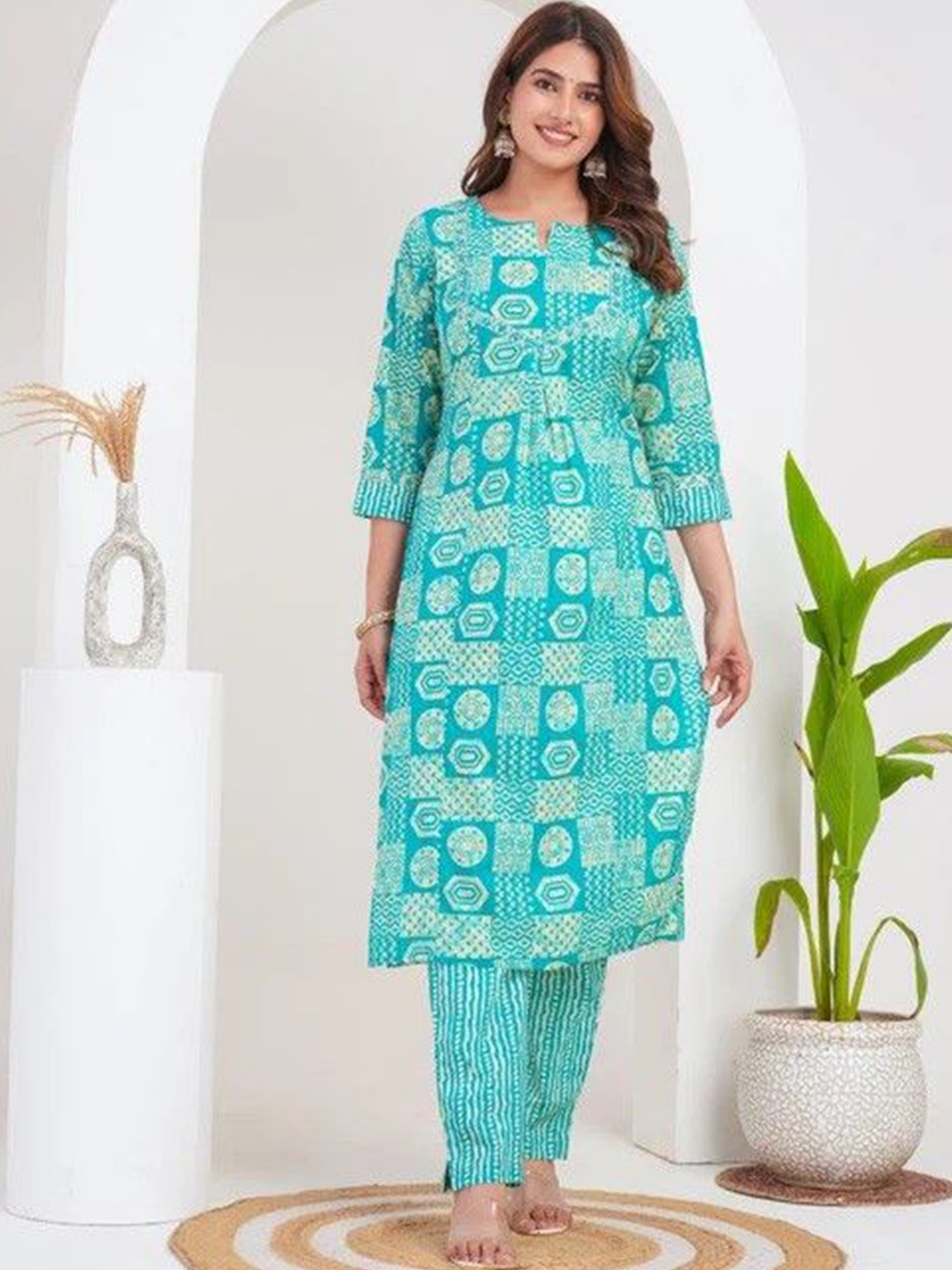 ZOYOTO Women Floral Printed Regular Thread Work Pure Cotton Kurta with Trousers, Turquoise blue
ZOYOTO Women Floral Printed Regular Thread Work Pure Cotton Kurta with Trousers, Turquoise blue