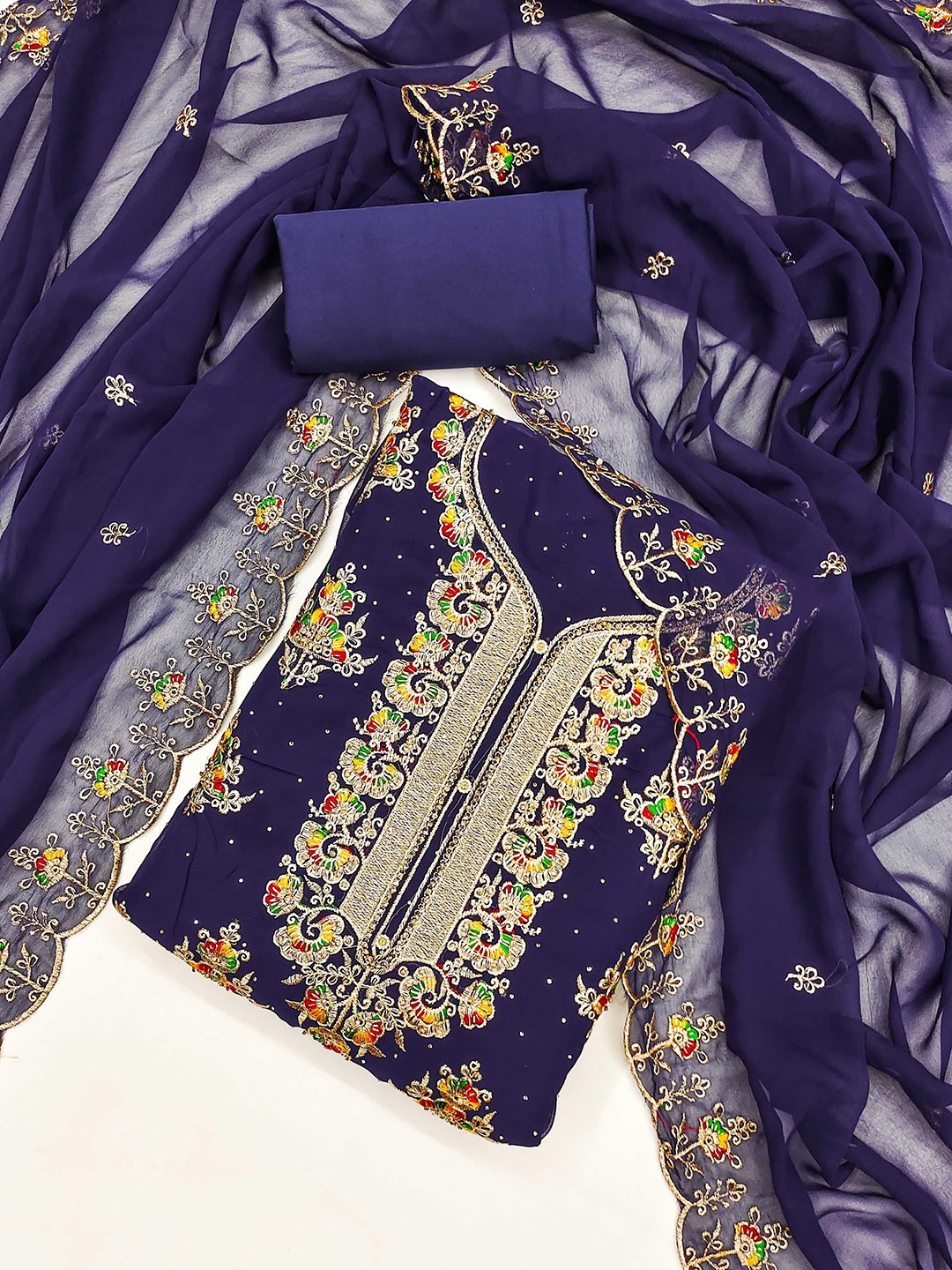 KALINI Ethnic Motifs Embroidered Beads and Stones Georgette Unstitched Dress Material, Blue
KALINI Ethnic Motifs Embroidered Beads and Stones Georgette Unstitched Dress Material, Blue