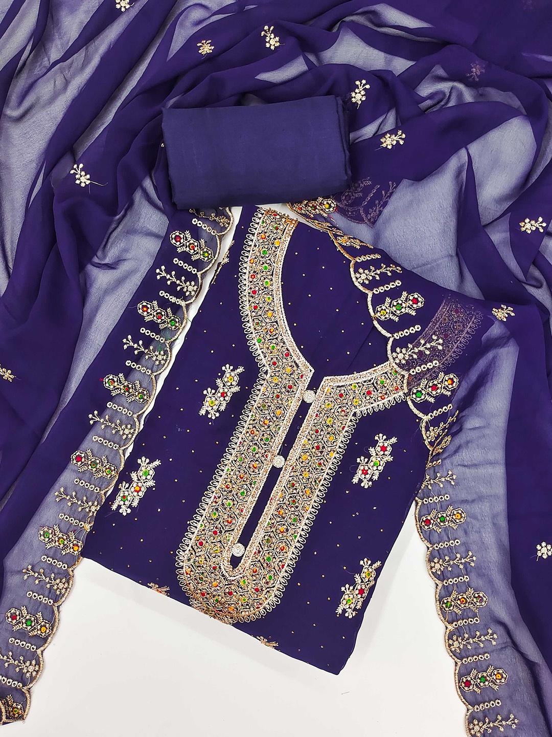 KALINI Ethnic Motifs Embroidered Beads and Stones Georgette Unstitched Dress Material, Blue
KALINI Ethnic Motifs Embroidered Beads and Stones Georgette Unstitched Dress Material, Blue