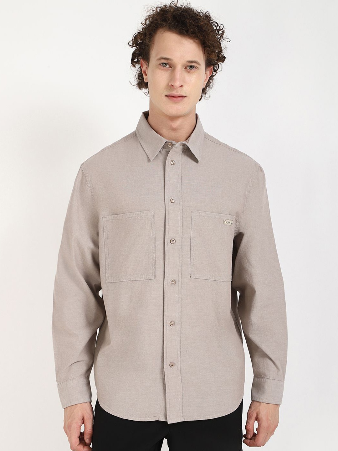 Calvin Klein Jeans Men Relaxed Fit Spread Collar Solid Cotton Casual Shirt, Grey
Calvin Klein Jeans Men Relaxed Fit Spread Collar Solid Cotton Casual Shirt, Grey