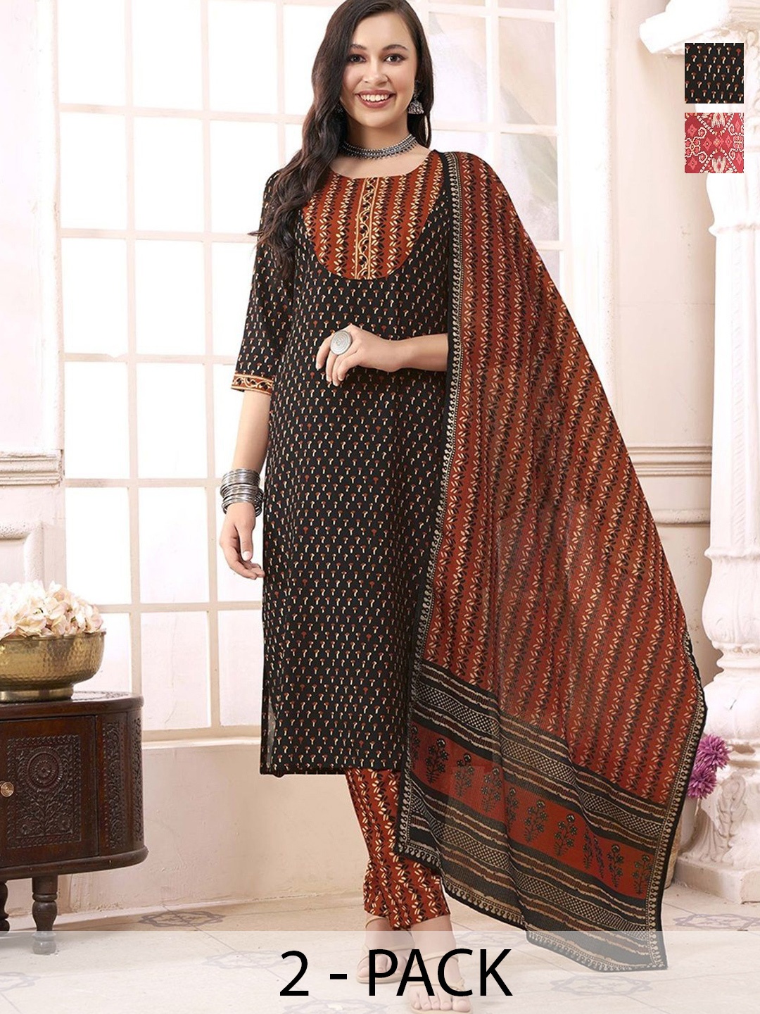 KALINI Selection Of 2 Floral Printed Straight Kurtas With Trousers And Dupattas, Brown
KALINI Selection Of 2 Floral Printed Straight Kurtas With Trousers And Dupattas, Brown