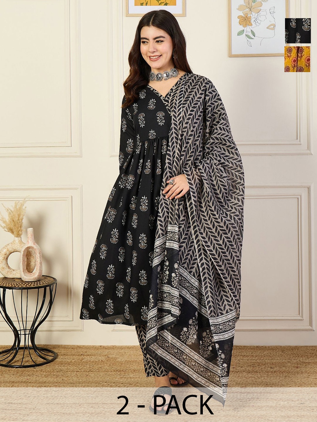 KALINI Selection Of 2 Floral Printed Angrakha Kurta With Trousers And Dupatta, Black
KALINI Selection Of 2 Floral Printed Angrakha Kurta With Trousers And Dupatta, Black