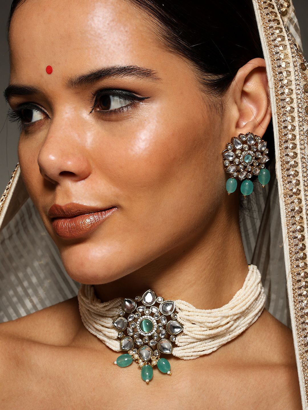 PATOLA BY VJ Gold-Plated Artificial Stones And Beads Stones-Studded & Beaded Jewellery Set
PATOLA BY VJ Gold-Plated Artificial Stones And Beads Stones-Studded & Beaded Jewellery Set