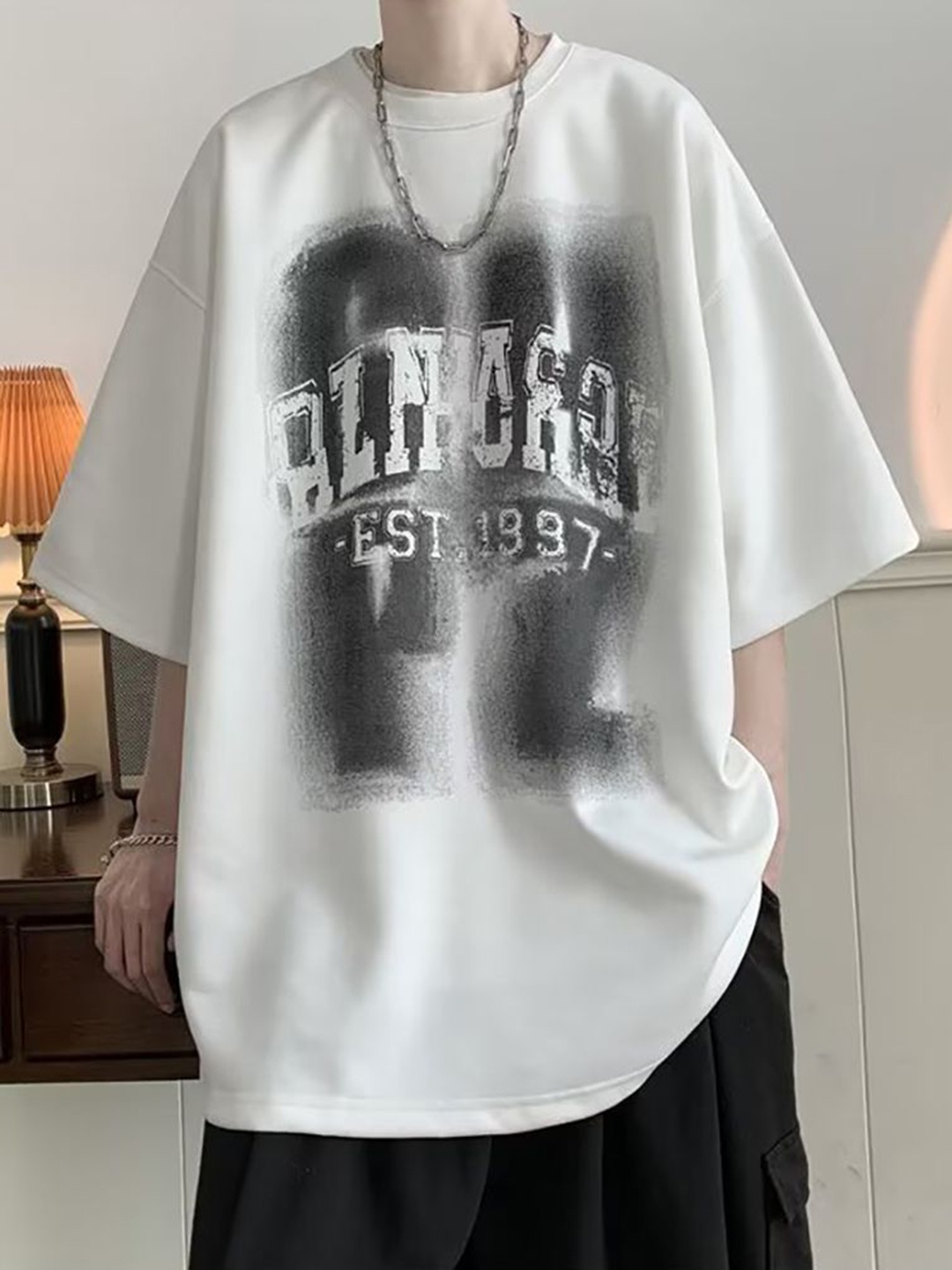 StyleCast x Revolte Men Typography Printed Round Neck Cotton Oversized T-shirt, White
StyleCast x Revolte Men Typography Printed Round Neck Cotton Oversized T-shirt, White