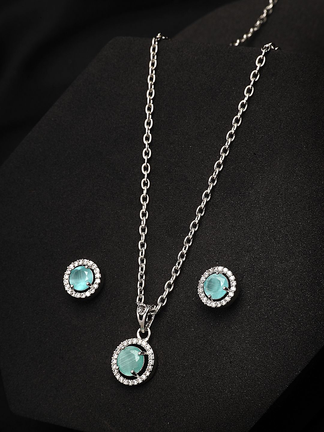 ZENEME Rhodium Plated Luxury AD Princess Cut Round Ocean Blue Pendant with Earrings Set, Silver
ZENEME Rhodium Plated Luxury AD Princess Cut Round Ocean Blue Pendant with Earrings Set, Silver