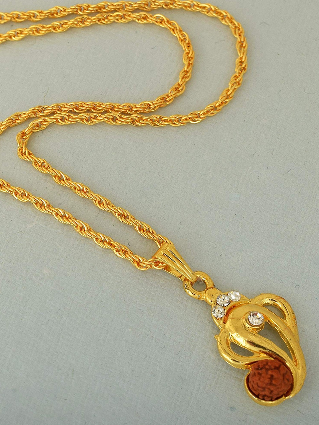 MEMOIR Unisex Gold Plated CZ & Rudraksha Studded Lord Ganesha Charm Pendant With Chain
MEMOIR Unisex Gold Plated CZ & Rudraksha Studded Lord Ganesha Charm Pendant With Chain