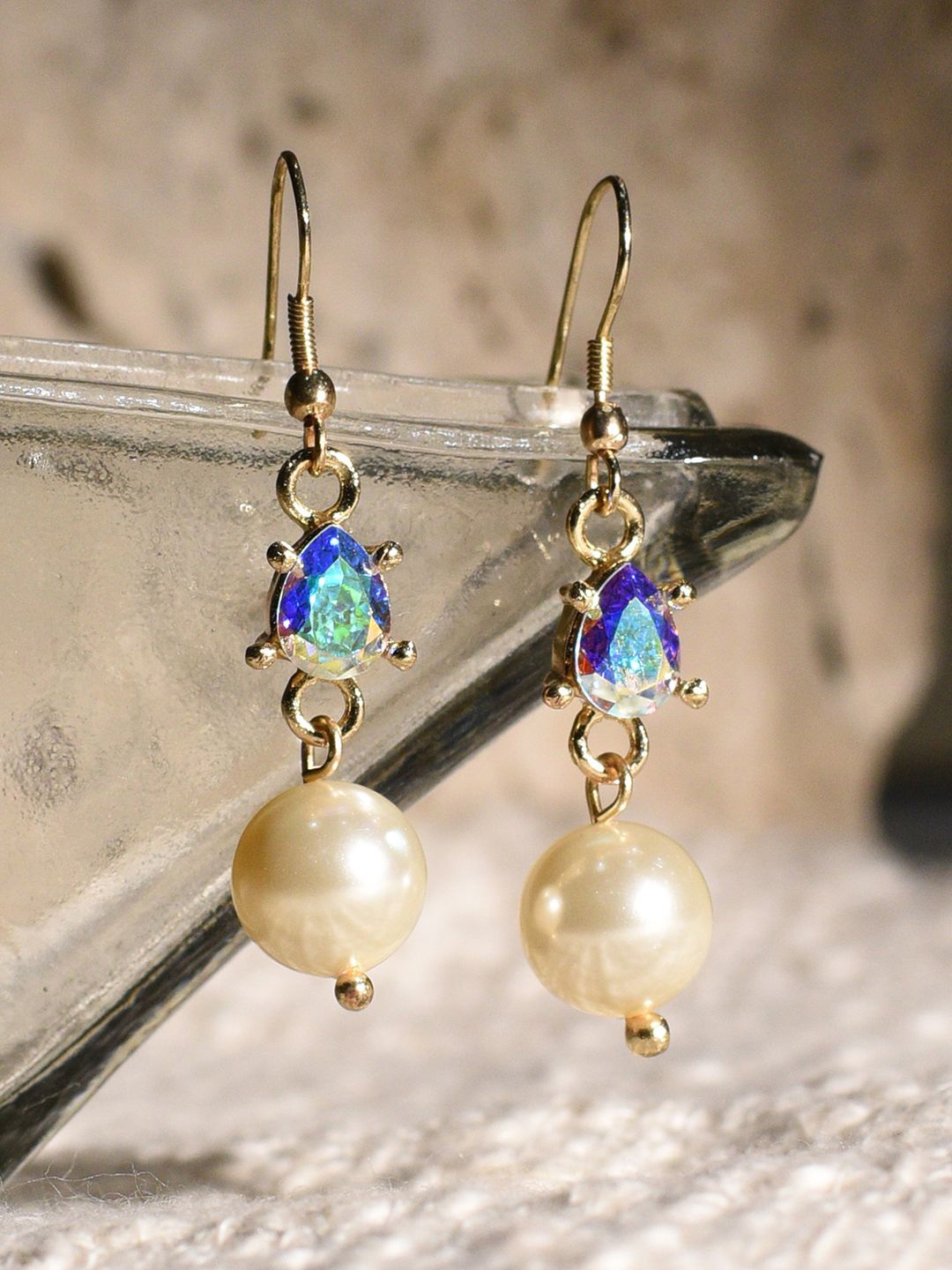XPNSV Gold-Plated Iridescent Crystal Studded And Pearl Beaded Teardrop Shaped Drop Earrings
XPNSV Gold-Plated Iridescent Crystal Studded And Pearl Beaded Teardrop Shaped Drop Earrings